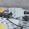 ATTEMA AK2-S/GZ 120×95 mm kötő doboz tartóelemmel hagyományos lemez kábeltálcákhoz 3 kábelbevezetővel IP40